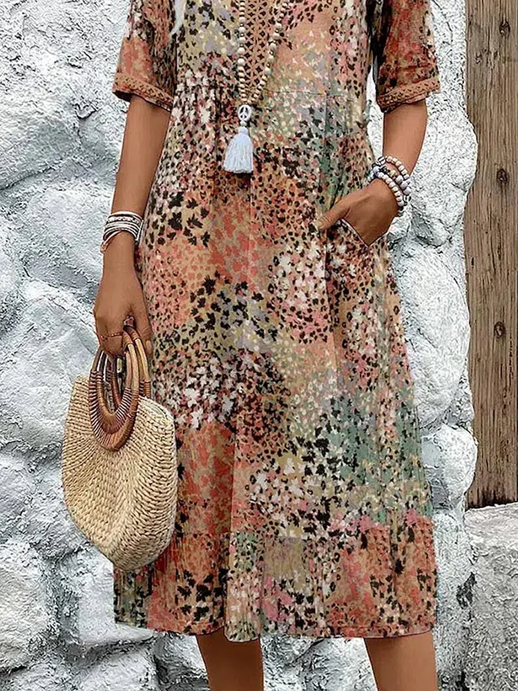 Véronique – Robe midi élégante à coupe fluide