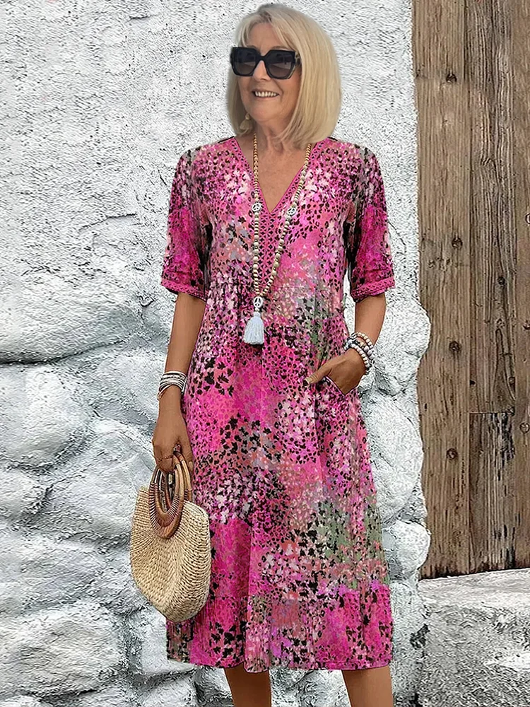 Véronique – Robe midi élégante à coupe fluide