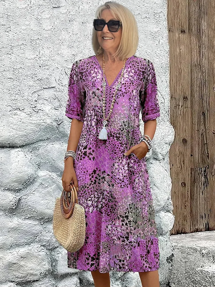 Véronique – Robe midi élégante à coupe fluide